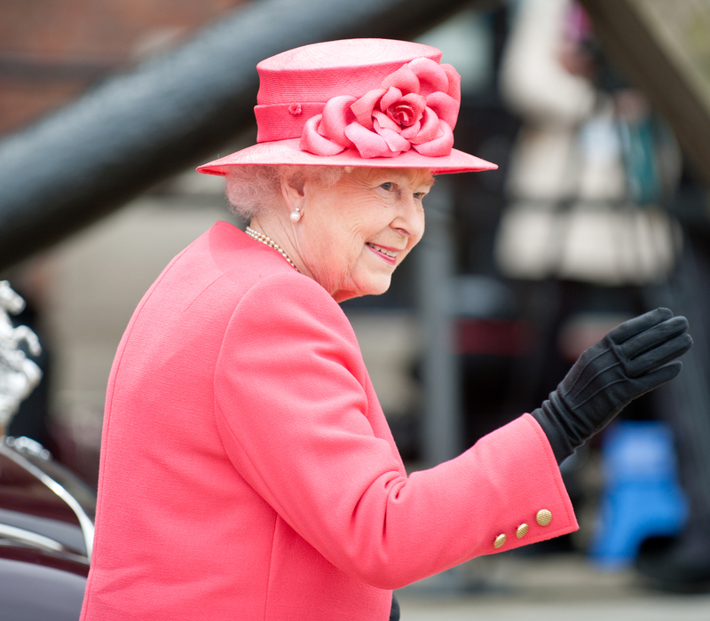 Queen Elizabeth II waving in Liverpool.