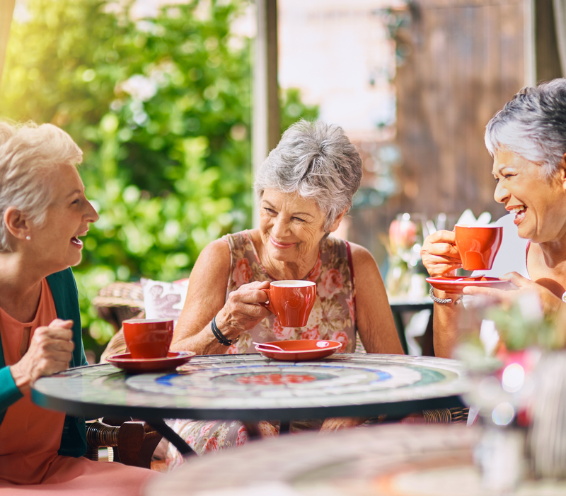 Three women at a café.